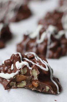 chocolate barkle with white icing and nuts on top, ready to be eaten