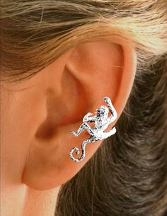 Such Good FUN, our Fun'ky Monkey Ear Cuff Left ear Non-pierced Unisex Earring. Lend Your Ear to Our fun Swinging Monkey Ear Cuff and You will see Smiles wherever You Go. He's always ready to Monkey around. His Arms Wrap Around Your Ear to comfortably & securely hold on the ear.  It's Simple to Adjust for a Comfortable Fit. No Holes, Clips or Posts Needed. Hand crafted in solid Sterling Silver or Gold or Rhodium over the Silver for a Carefree Finish. Originally designed for San Diego Zoo gift sho Swinging Monkey, Silver Ear Cuff Earrings, Unisex Earrings, Cuff Earring, Gift Shops, Tiny Bow, Earring Box, San Diego Zoo, Silver Ear Cuff