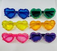 Bulk YOUTH sunglasses! A pack of 6 rainbow sunglasses! Playful Multicolor Sunglasses With Mirrored Lenses, Playful Polarized Sunglasses For Party, Playful Party Sunglasses With Polarized Lenses, Funky Sunglasses With Tinted Lenses For Parties, Playful Sunglasses With Uva Protection For Parties, Funky Tinted Sunglasses For Party, Playful Multicolor Sunglasses With Gradient Lenses, Trendy Multicolor Plastic Sunglasses, Playful Multicolor Party Sunglasses