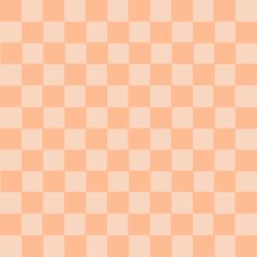 an orange and white checkered background with small squares on the bottom right hand corner