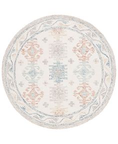 a round rug with an ornate design on the center and sides, in white and blue colors