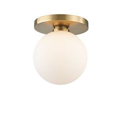 a light fixture with a white ball on the top and a gold metal frame around it