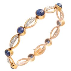 Beautiful 18k yellow gold bracelet featuring oval links with Rose cut diamond bars connected by cabochon sapphire buttons. Cabochon Bracelet, Blue Sapphire Bracelet, Gold And Silver Bracelets, Gold Link Bracelet, Gold Armband, White Gold Set, Purple Sapphire, Bracelets Gold Diamond, Sapphire Bracelet