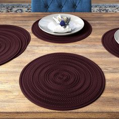 placemats and plates on a wooden table