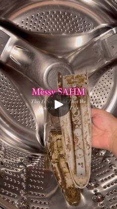 a dirty washer with the words messy ahm in front of it and an image of