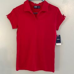 This New With Tags Izod Shirt In Red -Girls Size Xl/18-Has Cap Sleeves With Bows -Pictured/ Cotton And Polyester Blend. Originally $24 -Bundle With Other Items From The Closet For Greater Savings Or Make An Offer. Red Tops For School, Red Stretch Short Sleeve Shirt, Casual Stretch Tops For School, Red Summer School Tops, Red Summer Tops For School, Fitted Solid Color Tops For School, Red Collared Top For School, Red Short Sleeve Tops For School, Solid Fitted Tops For School