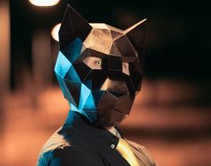 "Make your own 3D panther mask (or 3D jaguar mask) with paper or cardboard at home in minutes thanks to our printable template for kids and adults. ⚡ If you purchase this product you will have instant access to the PDF file (with easy-to-follow instructions and pattern) so you can print, assemble and customize the papercraft mask to your liking. 🎬 Tutorial video ➤ https://www.youtube.com/watch?v=aVH43bHaUxY 📐 Mask dimensions: 9.7\" x 11.9\" x 12.2\" / 24.8 cm x 30.3 cm x 31.0 cm. 📌 PDF conten 3d Mask Pattern Free, Template Papercraft, Cat Mask Diy, Mask Printable, Mascaras Halloween, 3d Mask, Mask Diy, Paper Mask, Cat Mask