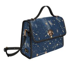 Blue Constellations Celestial Canvas Bag, Cute Stargazing Cross body purse, Satchel Purse with shoulder strap cute hand bag ► ABOUT THIS PURSE Colors: Bue, beige Design: constellations, stars Trim Color: Black Metal Color: Gold The design is printed on all sides. The handle and trim are black. The purse comes with a vegan shoulder strap. * Made from high-grade waterproof canvas, durable, water-resistant. This is a TEXTURED rigid material. * Can be used as a nice laptop iPad storage bag, business Elegant Blue Satchel, Casual Star-shaped Shoulder Bag For School, Star Shaped Purse, Black Star-shaped Shoulder Bag For Everyday Use, Celestial Handbag, Blue Crossbody Satchel With Gold-tone Hardware, Cute Hand Bags, School Bag College, Business Briefcase