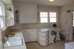 the kitchen is clean and ready for us to use in its new owner's home