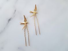 "Gold Bird Hair Pin Set of two, perfect for a Wedding, bridesmaids, or any occasion. Made with KC gold birds and pins. Wonderful for a woodland themed Wedding. Stick pins are perfect for an up-do hairstyle. Measures 3 1/2\" (including pin) and birds measure 1 1/2\" x 1\" Thank you for visiting Love Forever Bridal and please ask me any questions. Thanks so much! :)" Bird Hair Accessories, Bird Hair Pin, Bird Hair Clip, Peggy Olson, Gold Hair Pins, Hair Clips Wedding, Gold Birds, Gold Hair Pin, Bird Wedding