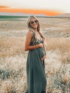 A solid sleeveless maternity maxi dress featuring adjustable cami straps, a ruffle hem, a smocked back and a ruffle v-neckline. Maternity Fashion, Ruffle Hem