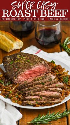 sliced roast beef on a white plate with rosemary garnish