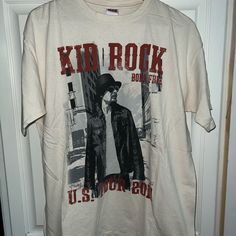 New, Never Worn, Kid Rick 2011 Tour Tee Shirt. Size L Casual Summer Shirt With Band Logo, Casual Shirt With Band Logo For Concert, Casual Fan Merchandise Shirt For Music Festivals, Rock Style Short Sleeve T-shirt For Fall, Casual Short Sleeve Shirt With Band Logo, Rock Style T-shirt For Streetwear In Fall, Rock Style T-shirt For Fall Concert, Rock Style T-shirt For Fall Streetwear, Rock Style Cotton Crew Neck Shirt