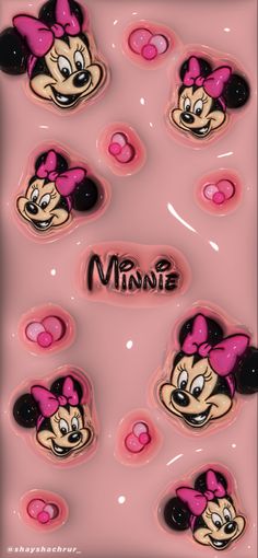 pink mickey and minnie mouse magnets with the word minnie on them