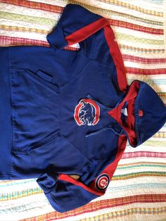 Vintage Majestic Cubs Hoodie  Embroidered Chicago Cubs logo Hoodie pocket and small pocket , see pics   NO SIZE TAG , please see measurements in pictures  Very good condition, No rips, tears or stains Red Cotton Hoodie For Fan Merchandise, Blue Fan Apparel Hoodie, Blue Hooded Hoodie For Sports Events, Vintage Blue Hoodie For Sports, Blue Cotton Hoodie For Fan Merchandise, Red Hooded Hoodie For Fan Gear, Throwback Blue Cotton Hoodie, Throwback Blue Hooded Hoodie, Blue Throwback Hooded Hoodie