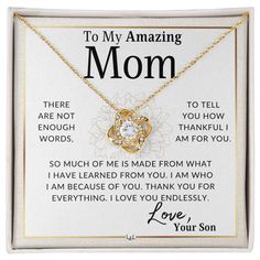 a necklace with the words to my extraordinary mom on it and an image of a heart