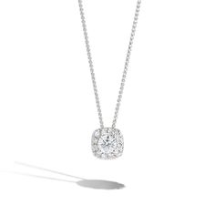 An elegant .25ct round cushion halo necklace showcasing .30ctw pave diamonds in the cushion halo. The pendant hangs on a beautiful 14K white gold dainty chain. Diamond White Halo Diamond Jewelry, Diamond Jewelry With Halo Design And Round Stone, Halo Designed Round Diamond Jewelry, Refined Diamond Jewelry With Round Cut, Refined Round Cut Diamond Jewelry, Refined Single Cut Round Diamonds Jewelry, Refined Lab Grown Diamond Jewelry In Diamond White, Timeless Round Cut Halo Jewelry, Timeless Halo Design Round Cut Jewelry