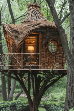 a tree house in the middle of a forest