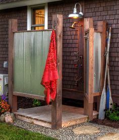 an outdoor shower that will help you let loose water in your house and keep it clean