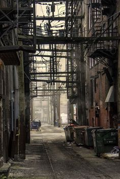 an alley way with lots of scaffolding on it