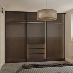 a bedroom with sliding closet doors and a bed