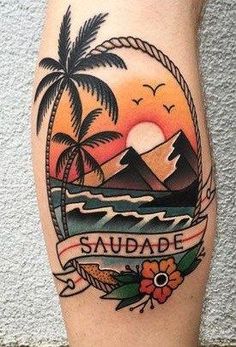 a tattoo on the leg of a person with mountains and palm trees