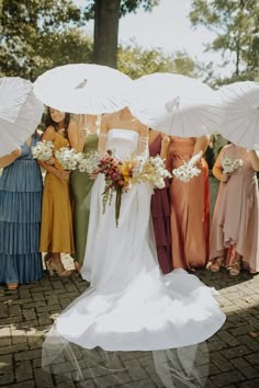 Colorful Mismatched Bridesmaids Dresses for Summer Wedding with White Wedding Parasols and Wildflower Bridal Bouquet Bridesmaids White Dresses, Late Summer Wedding Bridesmaid Dresses, Multi Color Bridesmaid Dresses Summer, Miss Match Bridesmaids, Summer Mismatched Bridesmaid Dresses, Bridesmaid Dresses Wildflowers, Citrus Bridesmaid Dresses, Bridesmaids Parasols, Wild Flower Bridesmaid Dresses