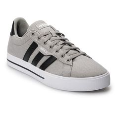 Bring sport style to your casual wardrobe with these adidas Daily 3.0 Men's Sneakers. SHOE FEATURES Clean everyday style Comfortable insole with long lasting anti-microbial properties to reduce bad odors Low-cut profileSHOE CONSTRUCTION Canvas upper Textile lining Foam midsole Rubber outsoleSHOE DETAILS Round toe Padded foam footbed Lace-up closure Size: 7.5. Color: Med Grey. Gender: male. Age Group: adult. Clean Everyday, Daily 3, Athleisure Men, Sports Style, Sport Style, Shoes Sneakers Adidas, Adidas Samba Sneakers, Grey Adidas, Adidas Superstar Sneaker