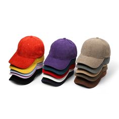 five different colored hats are lined up together