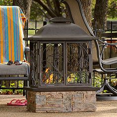 an outdoor fireplace next to a swimming pool