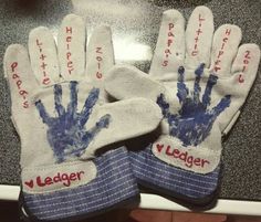 two pairs of gloves with handprints on them that say happy birthday daddy and father