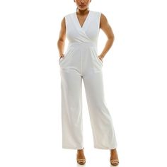 Perfectly polished. This women's Nina Leonard surplice jumpsuit provides undeniable style.Click on this WOMEN'S GUIDE to find the perfect fit and more! Perfectly polished. This women's Nina Leonard surplice jumpsuit provides undeniable style. Click on this WOMEN'S GUIDE to find the perfect fit and more! FEATURES Crepe construction 2-pocket Zipper back Unlined Surplice neckline SleevelessFIT & SIZING Overall length: 57-in. length from shoulder to hem 29-in. inseam 22-in leg opening Straight-leg o Surplice Neckline, One Piece Outfit, Clothing Size Chart, Womens Clothing Sizes, Color Ivory, Polyester Spandex, Gender Female, Age Group, Overalls