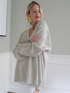 Our favorite slouchy cardigan in a luxuriously soft cashmere blend. The Everyday Cardigan features an oversized fit making it perfect for layering. You'll never want to take this one off. Fabric: 90% Wool, 10% Cashmere. Color-way: Oatmeal Heather. Model is 5'9" and wearing size small. Dry Clean Only. Oversized Fall Sweater Coat With Soft Texture, Oversized Soft Sweater Coat For Fall, Oversized Neutral V-neck Sweater, Soft Texture Cardigan For Everyday Fall Wear, Versatile Soft Knit Cardigan For Everyday, Versatile Everyday Soft Knit Cardigan, Cozy Oversized Sweater Coat For Everyday, Cozy Relaxed Fit Sweater Coat For Everyday, Oversized Cozy Sweater Coat For Everyday