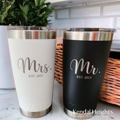 two personalized tumblers sitting next to each other