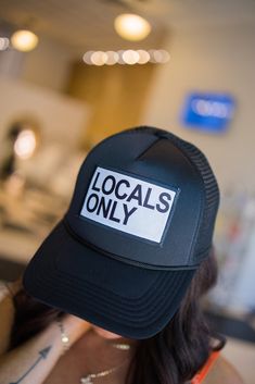 Locals Only! Black trucker hat with adjustable back. Comfortable and adjustable-one size fits all. The trucker hat style is so on-trend and super flattering. This hat is the perfect accessory for your next girl's trip! -100% polyester foam front, 100% nylon mesh back. -Adjustable snapback. Trendy Mesh Baseball Cap, One Size Fits Most, Trendy Mesh Baseball Cap, Trendy Adjustable Mesh Baseball Cap, Trendy Mesh Trucker Hat With Adjustable Fit, Trendy Mesh Trucker Hat Snapback, Adjustable Mesh Hat With Letter Print, Trendy Adjustable Mesh Trucker Hat, Trendy Mesh Snapback Trucker Hat, Letter Print Mesh Snapback Hat