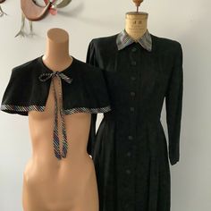 Offered for your consideration this incredible 1940's Black Gabardine Dress with matching Caplet.  Absolutely beautiful and guaranteed gently worn.  The collar and trim detail are divine and add a little pop of color.  Lovely worn with or without the caplet.  Epitome of 1940's with heavily padded shoulders.  Made by JohnnyE, a sought after 1940's dress line.  Button up the front closure and has additional Snap closure at Waist, Neck and Sleeves.  (Sorry no belt)    Dress has the wonderful Drape 1940’s Dress, 1940's Dress, Gabardine Dress, Belt Dress, 1940s Dresses, Vintage Inspiration, Christmas Story, 50s Fashion, Trim Detail