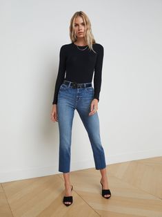 An indispensable high-rise cropped jean in medium blue premium stretch denim with meticulous sanding on hip, thigh, and seat for an authentic weathered look. With classic five-pocket construction, style also includes slim straight leg finished with clean raw hem. Zip fly closure. | L'AGENCE Sada Slim-Leg Cropped Jean In Cambridge Stretch Medium Wash Cropped Jeans For Fall, Medium Wash Jeans With Belt Loops For Fall, Dark Wash Mid-rise Cropped Jeans For Fall, Mid-rise Cropped Jeans Medium Wash, Mid-rise Cropped Jeans Medium Wash For Fall, Mid-rise Dark Wash Cropped Jeans For Fall, Mid-rise Cropped Jeans In Medium Wash For Fall, Fall Cropped Leg Dark Wash Jeans, Mid-rise Medium Wash Cropped Jeans With Belt Loops