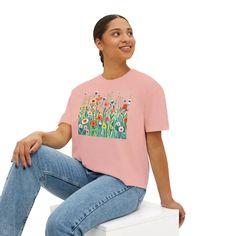 Wild Flowers Boxy Fit Tee: Comfort Meets Laidback StyleStep into a world of cozy vibes and total comfort with the Wild Flowers Boxy Fit Tee. This women's oversized tee is your go-to for laidback style that perfectly suits any occasion, from brunch dates to relaxing weekends. Crafted from 100% ring-spun cotton, it offers unmatchable softness and an effortlessly cool look. The slightly cropped, seamless body creates that chic, oversized fit that everyone loves.Comfort Colors proudly participates i Womens Oversized Tee, Laidback Style, Brunch Dates, Boxy Tee, Oversized Style, Cool Look, Cozy Vibes, Laid Back Style, Oversized Tee