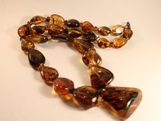 130g Natural Dominican Amber Necklace, 14 inches Luxury Amber Necklace With Polished Finish, Classic Amber Necklaces For Jewelry Making, Elegant Amber Jewelry With Polished Beads, Luxury Handmade Amber Necklace, Luxury Handmade Brown Necklaces, Luxury Handmade Brown Necklace, Elegant Long Amber Necklace, Elegant Brown Round Necklace, Elegant Brown Round Necklaces