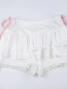 Side drawstrings,Layered bloomers,Lace patchwork,Material: Polyester spandexColor: Pink, WhiteSize: S, M, L Unit: CM Waist Hip Length S 61-68 72-92 31 M 65-72 76-96 32 L 69-76 80-100 33 * 1cm ≈ 0.3937 inchNote: There may be 2-3cm error due to manual measurement. If you need size help, please drop us a message, we'd lov