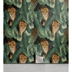 an animal themed wallpaper with leopards and tropical leaves