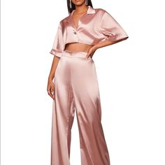 Light Pink Satin Crop And Pant Set. Never Worn Chic Two-piece Solid Pants, Chic Satin Summer Sets, Chic Summer Satin Sets, Elegant Two-piece Bottoms For Spring, Wide Leg Two-piece Party Bottoms, Party Wide Leg Two-piece Bottoms, Party Two-piece Wide Leg Bottoms, Two-piece Wide Leg Pants For Night Out, Chic Two-piece Bottoms For Night Out