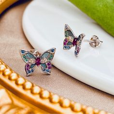 Gorgeous Butterfly Stud Earrings Made Of Sterling Silver Bring A Hint Of Enchantment And Romance To Any Look. Artfully Adorned With Colorful Cubic Zirconia And Enamel, These Feminine Earrings Add Eye-Catching Luxury To Any Outfit. An Exquisite Attention To Detail Gives These Earrings A Delicate Sophistication That Is Sure To Become A Treasured Favorite. Metal: Sterling Silver Hypoallergenic Hallmark: 925 Polished Plating: Platinum Length: 9mm X 12 Mm ***Images Are Taken By Me In My Studio And Ar Feminine Earrings, Dichroic Glass Earrings, Butterfly Stud Earrings, Diamond Huggies, Butterfly Earrings Stud, Bee Earrings, Cz Stud Earrings, Silver Butterfly, Beaded Hoop Earrings