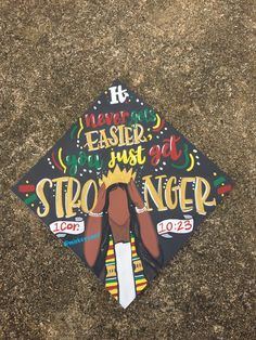 a decorated graduation cap with the words, easter just strobinger on it