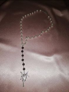 ▪Rosary Y2k Necklace▪ ▪ Glass pearls and charm were used 🖤 ▪ You can choose the charm you want from the options 👁 ▪ 48 cm & adjustable ▪ It is handmade 🍀 ▪ If you have any questions, I'll be happy to answer 💟 ▪ Avoid contact with perfume or other chemicals 🌿 Fairy Charm Necklace, Necklace Grunge, Fairycore Necklace, Gothic Necklaces, Black Rosary, Necklace Fairy, Rosary Style Necklace, Jewelry Y2k, Personalized Rosary