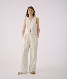 These wide-leg ivory trousers are made from a luxuriously soft yet crisp ivory crinkled cotton linen. Pair with the Sayaka Davis button-down vest for a chic warm weather look. Concealed zip and hook fastening. Details Lined Cotton 65% and Linen 35% 100% cotton liner Hook and eye closure Detachable belt Ivory Trousers, Cold Weather Hats, Trouser Pants Women, Independent Women, Down Vest, Bottom Clothes, Designer Outfits Woman, Top Shoes, Cropped Pants