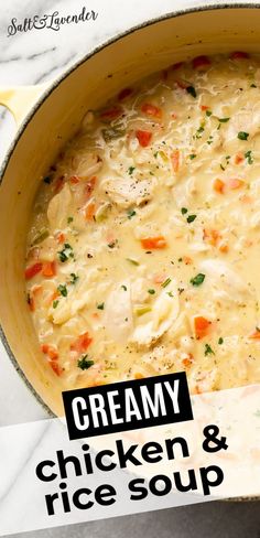 creamy chicken and rice soup in a yellow pot on a marble counter top with the title overlay