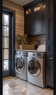 a washer and dryer in a small room