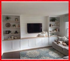 a living room filled with furniture and a flat screen tv mounted on the wall above it