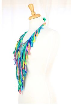 "Handmade crochet fringe necklace in a lovely and bright, \"tropical punch\" cotton colorway. Unique and eye-catching, you'll love the over-sized, flattering v shape of this crochet piece and the way it catches the breeze as you stroll through Palisades Park...like a bohemian daydream!! It's a very fun and light weight fantasy fashion accessory, with high fashion impact!! ♥One size fits most. ♥Adjustable ties at back neck. ♥100% cotton yarn. ♥Hand wash cold; lay flat to dry. ♥Fringe is approxima Multicolor Macrame Necklace For Festivals, Multicolor Fringe Necklace For Festival, Multicolor Beach Necklace With Tassels, Multicolor Fringe Beach Jewelry, Multicolor Fringe Jewelry For Beach, Multicolor Fringe Jewelry For The Beach, Punch Crochet, Belly Dancing Accessories, Statment Necklace